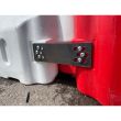Close-up of heavy-duty steel linking plate securely bolting together red and white Defender50 crash-rated barriers for maximum stability.