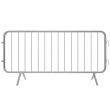 Front view of a galvanised steel crowd control barrier with fixed legs, featuring vertical infill bars and interlocking hooks on one side.