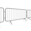 Angled side view of multiple galvanised steel crowd control barriers connected together on a white background.