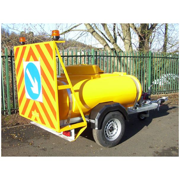 Yellow Water Bowser with additional Chevron Add-On Product pictured in situation by roadside.