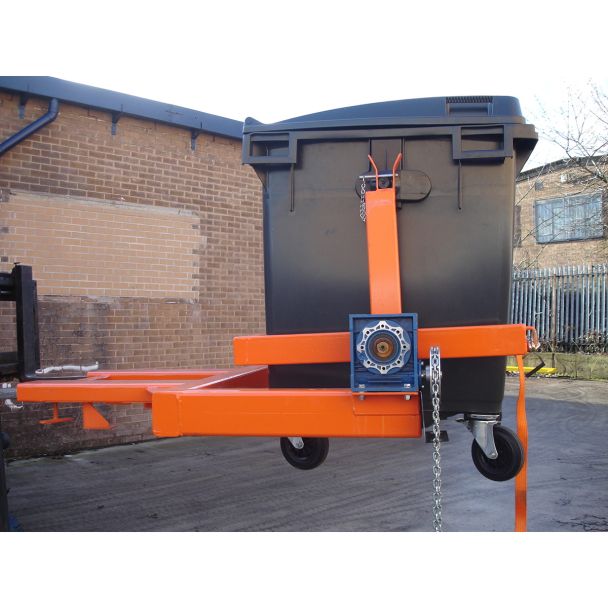 Heavy-duty wheelie bin tipper forklift attachment holding industrial waste bin securely for controlled lifting and tipping.